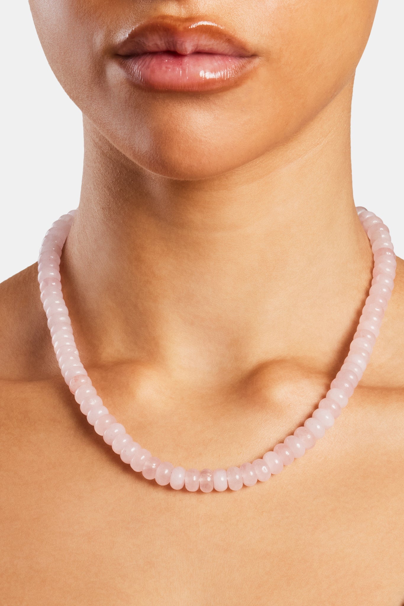 Female model wearing the rose quartz bead necklace