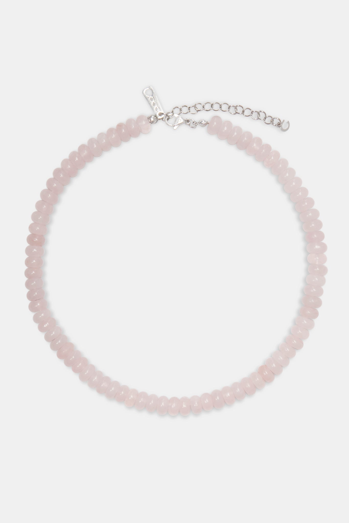 Rose quartz bead necklace in white background